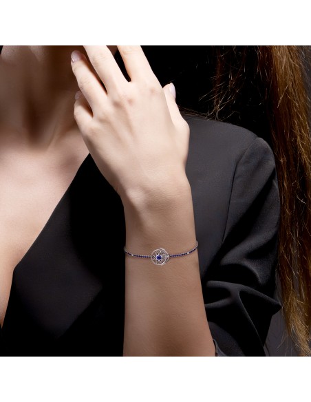 Tennis bracelet with sapphire, diamond and solar buckle