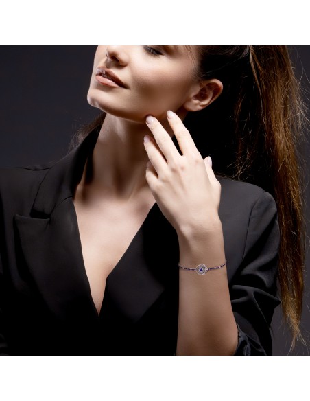 Tennis bracelet with sapphire, diamond and solar buckle